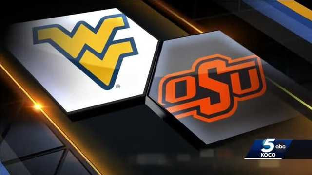 White rushes for 158 yards as West Virginia dominates Oklahoma State, 38-14