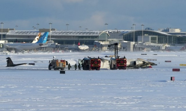 Questions emerge about what may have caused Delta plane to burst into flames and flip over Questions emerge about what may have caused Delta plane to burst into flames and flip over