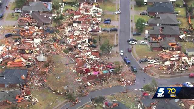 Tornado leaves Oklahoma City neighborhood picking up the pieces